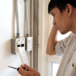 A,Man,Confusing,To,Fix,The,Electrical,Switch,On,The